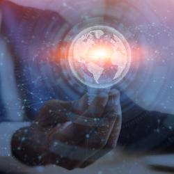 Idea, brainstorm, seminar or online webinar, business, remote work and study. Young unrecognizable black guy in suit works on computer, hold glowing light bulb, double exposure planet and connect