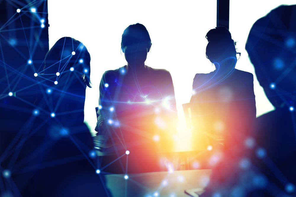 Academic Engagement Business people collaborate together in a modern office. Internet connection effects. Double exposure effects